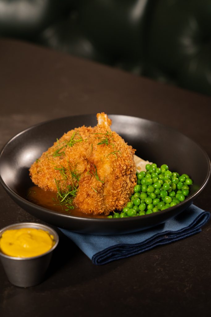 Crumbed Pig Wing with Garlic Peas, Mash ajnd Kraut - Don KRC Foodservice